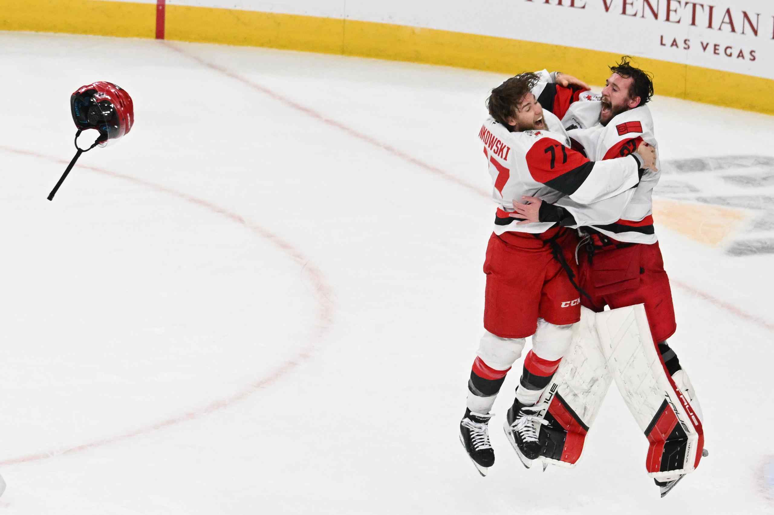 The Hurricanes Brandon Bussi and Mark Jankowski celebrating winning the Stanley Cup.